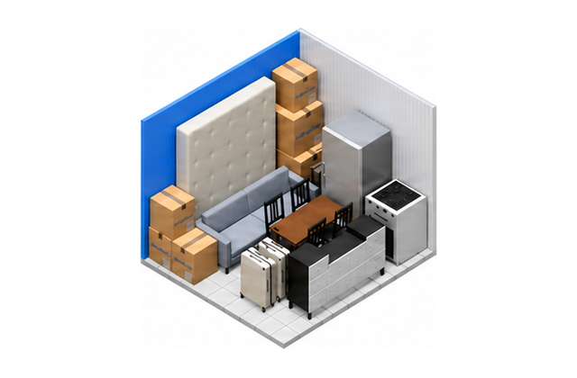 Boxes and furniture arranged inside a 10×10 storage unit